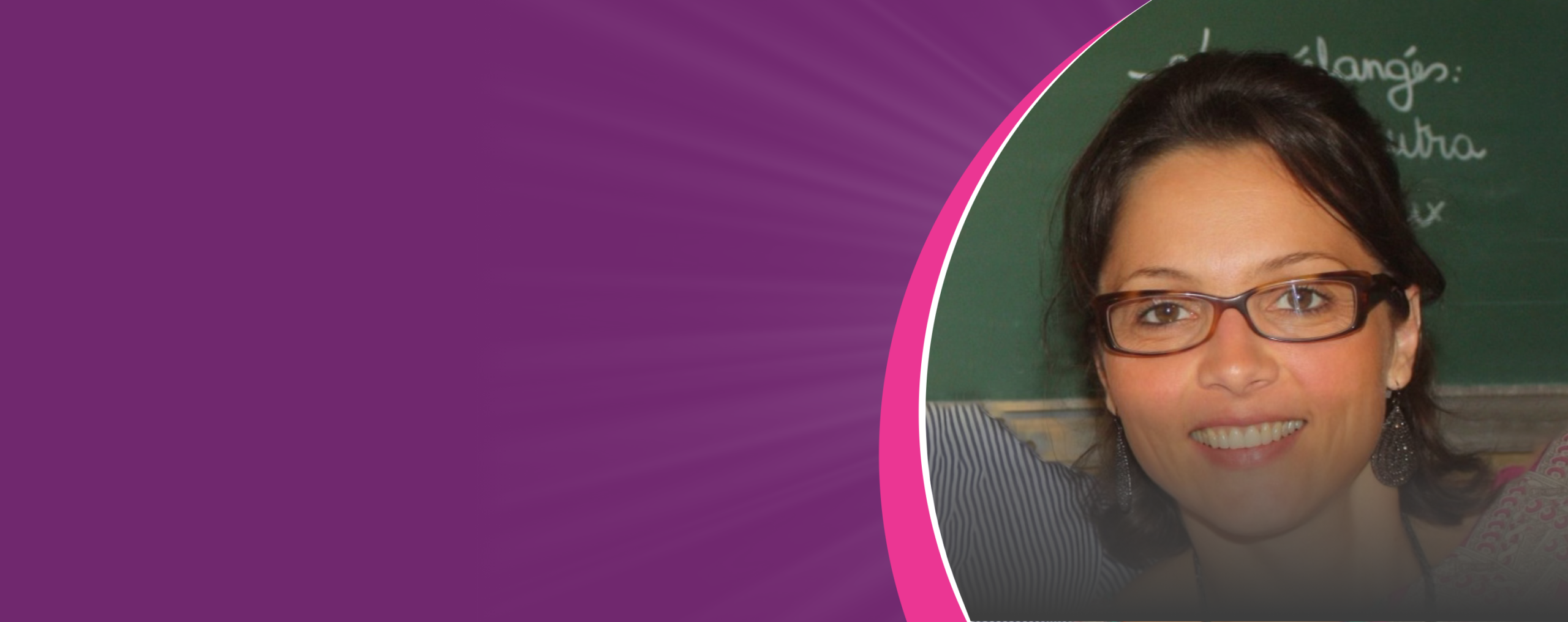 Breast cancer survivor and teacher smiling in front of a chalkboard